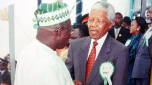 Former President Olusegun Obasanjo of Nigeria and former South African President, Nelson Mandela
