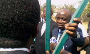 Chief Registrar of the court, Mr Lawrence Arojo addressing journalists during the protest. 