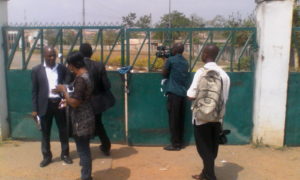 Journalists at the entrance of the Osogbo High Court. 