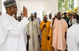 Buhari waving to Muslims at the State House Jumaat Mosque