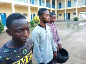 The suspected killers with the clay pot used to roa Timileyin's head