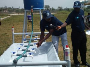 Demonstration on hand washing by UNICEF resource person at Ataoja High School, Osogbo