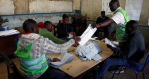 Election officials count ballot papers during Kenya's presidential election in Nairobi
