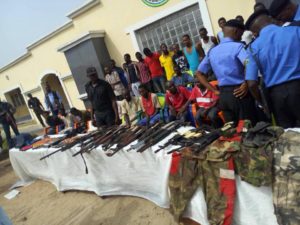 The criminals With Their Weapons When They Were Paraded In Lokoja
