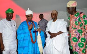 From right, Vice President B Zone of the Nigerian Union of Journalist, Comrade Cosmos Oni; Governor Rauf Aregbesola of Osun; the  Ajero of Ijero, Oba Adewole Adebayo and Chairman Osun NUJ, Comrade Abiodun Olalere, during the presentation of Golden Merit Award to Governor Aregbesola for unprecedented Infrastructural Development, at the atlantis Civic Centre, Osogbo on Thursday 19-04-2018