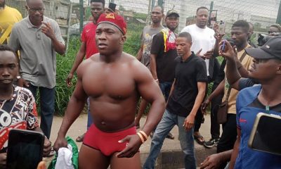 Protester Goes Half-Naked In Lagos