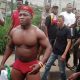 Protester Goes Half-Naked In Lagos