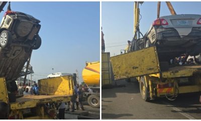 Drivers Survives As 40ft Container Crashes Onto Car In Lagos