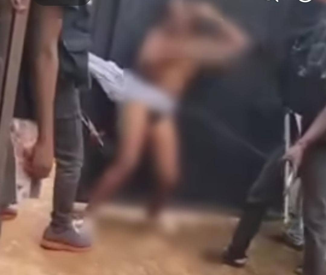 VIDEO: Corps Member Beaten, Stripped by Vigilantes in Anambra